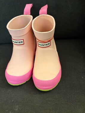 Hunter Kids' Play Boots, a waterproof rain boot designed for puddle splashing.